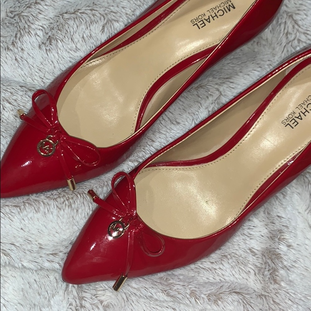 Shiny red leather MK pumps like new!